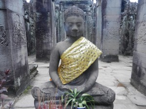 A relatively new Khmer type Buddha statue in the Bayon, Angkor, Cambodia