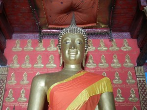 The ancient Sukhothai style Buddha at Wat Monorom, Luang Prabang, Laos.