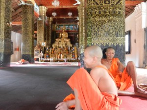 Monks in Wat That Luang, Luang Prabang, Laos.